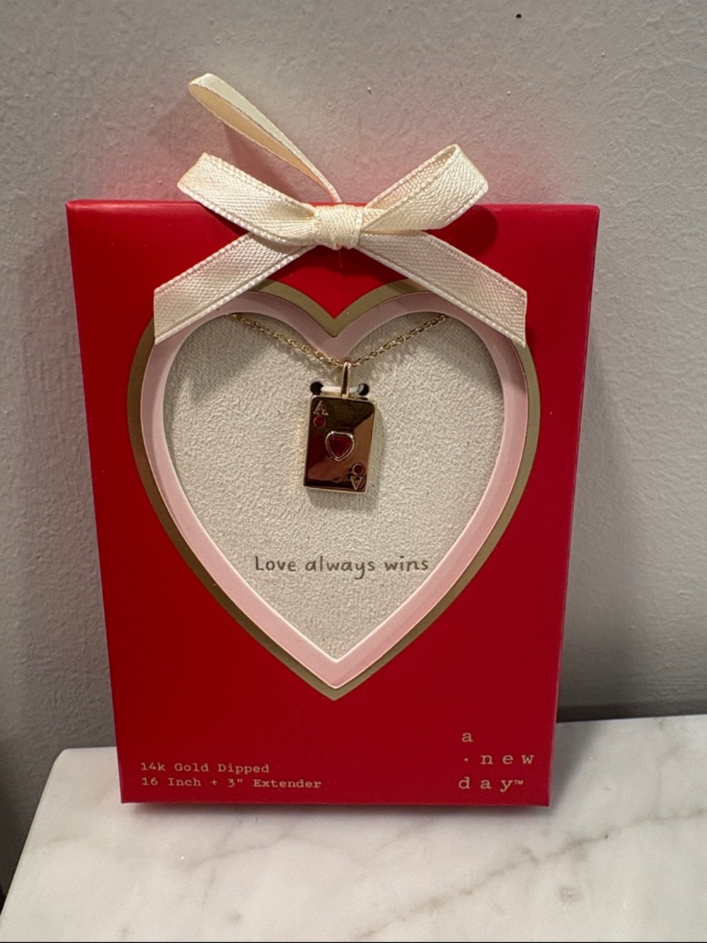 a new day Gold Dipped Book Pendant Necklace with Red Accents